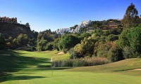 another view of the la cala golf resort hotel with the hills in the background
